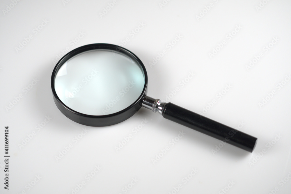 Magnifying glass on white background with gentle depth of field. Magnifier tool. Magnifying glass on white background with gentle depth of field. Magnifier tool.