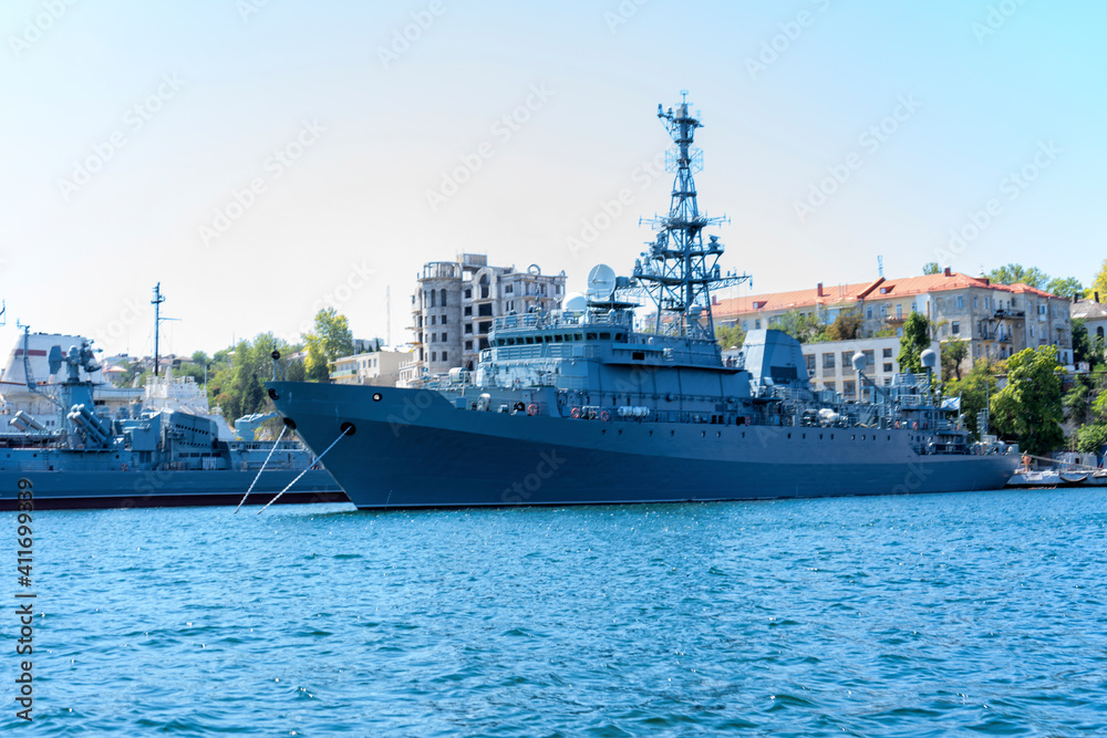 Large ships and waves in the sea, sunny Crimean summer