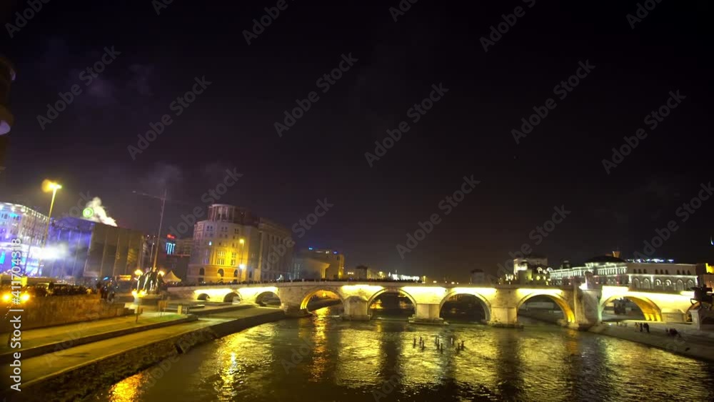 Panorama of Vardar river in Skopje with fireworks. Celebration of the New Year Panorama of Vardar river in Skopje with fireworks. Celebration of the New Year