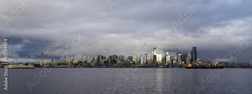 View of the city of Seattle over the Puget sound as seen from Alki Beach in West Seattle