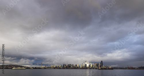 View of the city of Seattle over the Puget sound as seen from Alki Beach in West Seattle