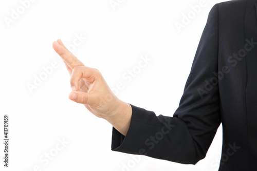 OK gesture in front of white background