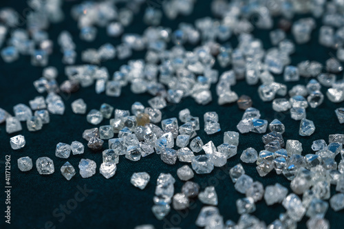 A scattering of small transparent diamonds on velvet © nordroden