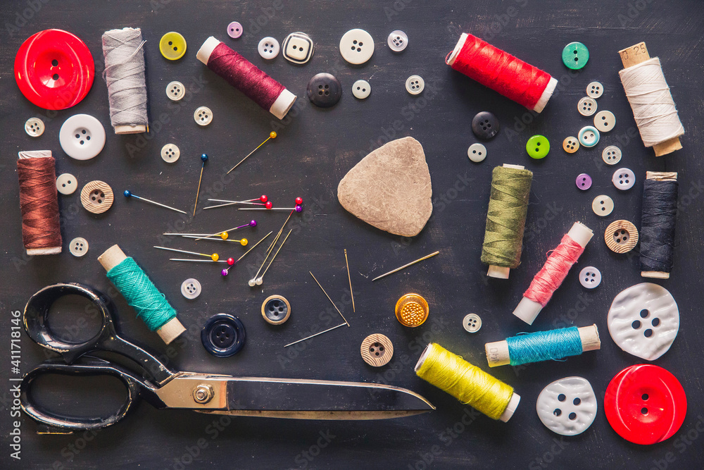 Tailor's set: Scissors, needles, threads, buttons, thimble and chalk