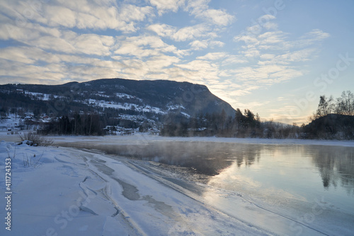 Winter theme at Hallingdalselva. A beautiful river in Hallingdal  Gol is freezing up in the cold February morning.  