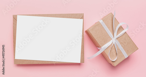 Gifts with note letter on isolated pink background, love and valentine concept