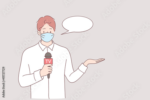 Working during pandemic of covid-19 concept. Portrait of young caucasian male journalist cartoon character in medical protective face mask talking with microphone for news program outdoors at outbreak