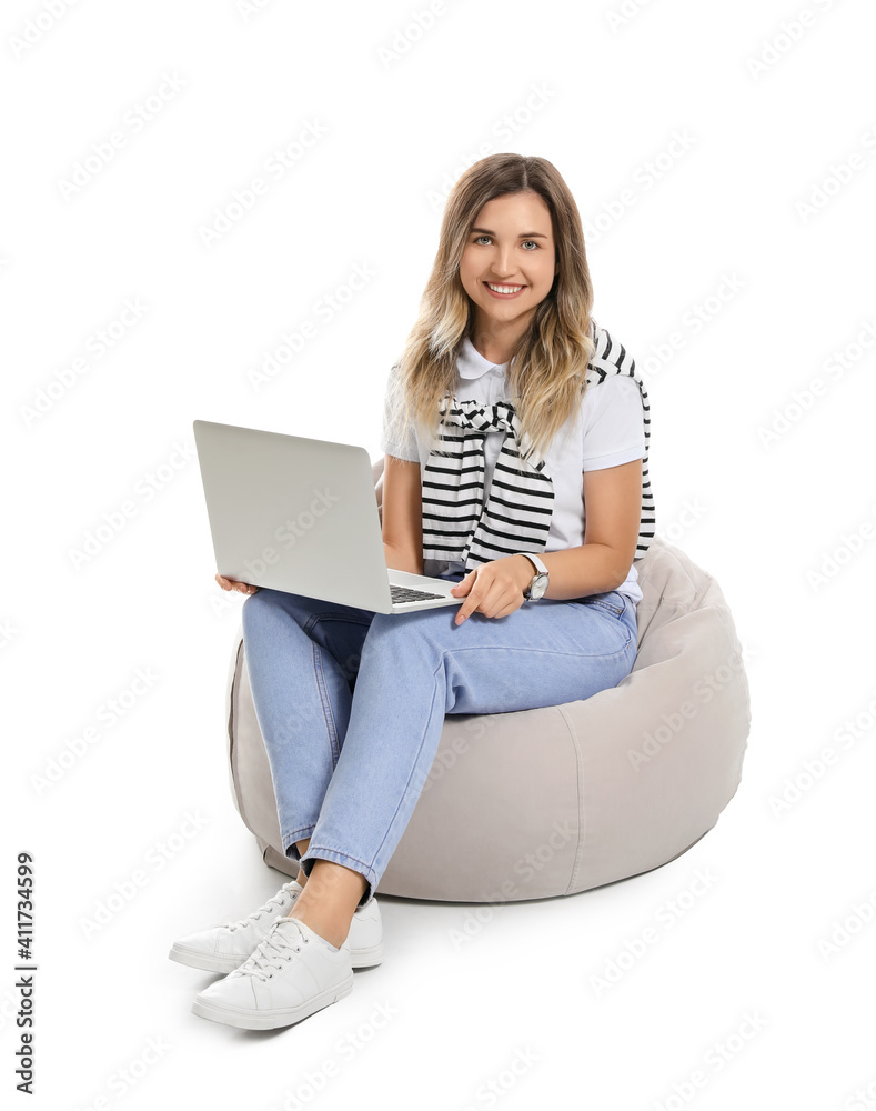 Fototapeta premium Young woman with laptop on white background