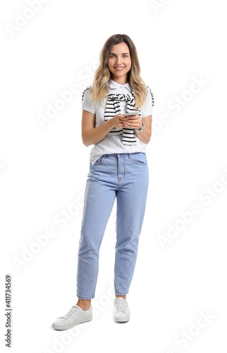 Young woman with mobile phone on white background