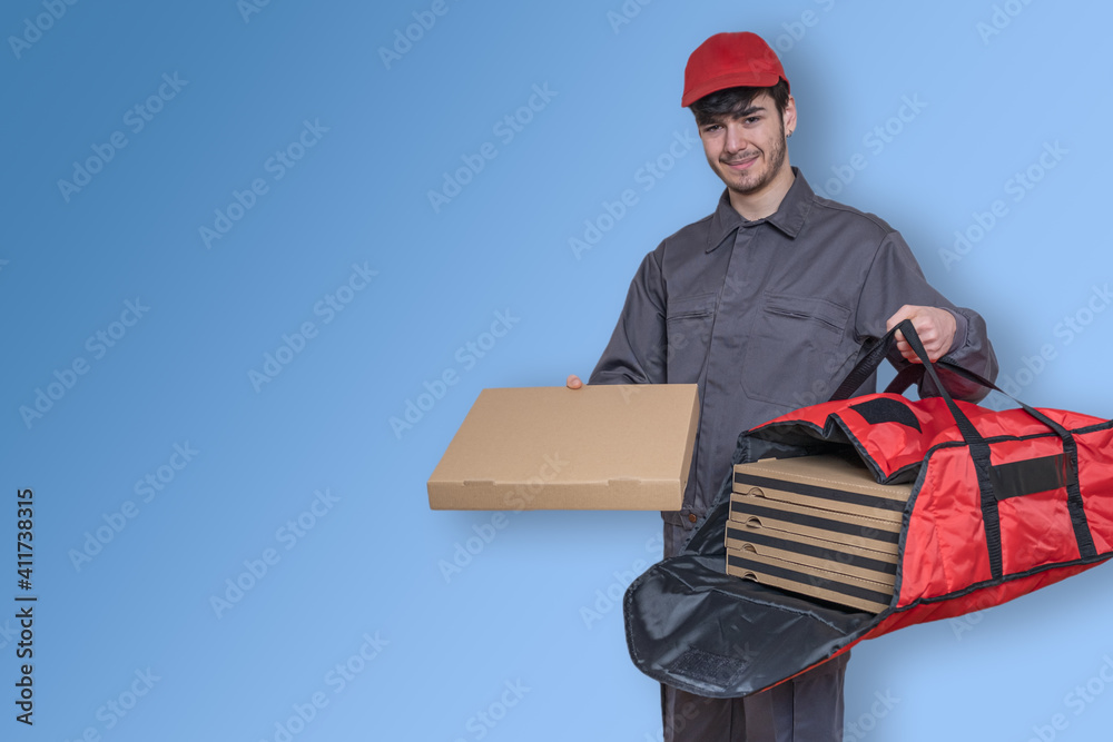 Delivery man in uniform delivering pizza to homes, fast food doorstep Delivery man in uniform delivering pizza to homes, fast food doorstep