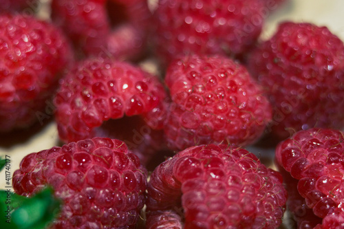Fresh Clean Raspberry Fruits on Cutting Board