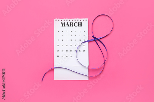 Calendar and violet ribbon ...