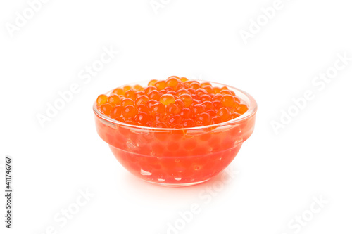 Glass bowl with caviar isolated on white background