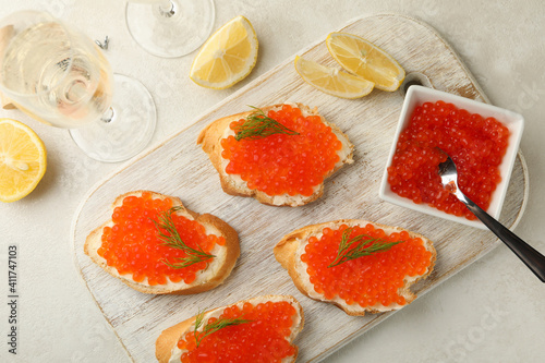 Concept of delicious eat with sandwiches with red caviar