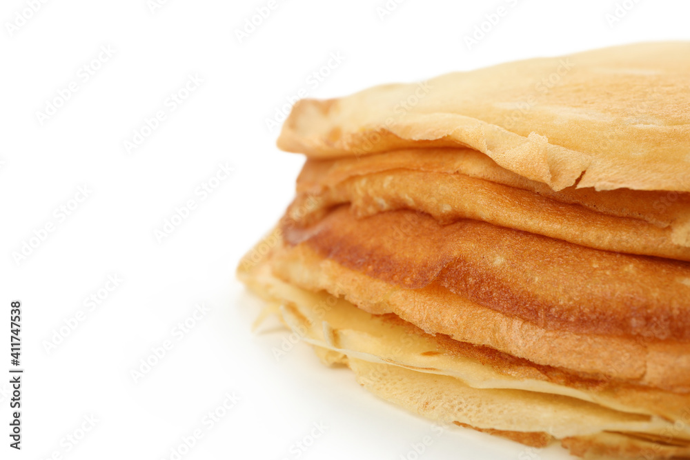 Tasty thin pancakes isolated on white background Tasty thin pancakes isolated on white background