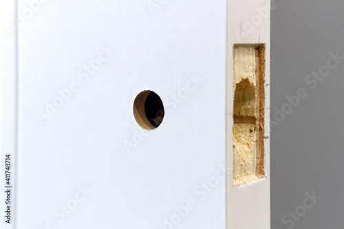 Installation of a doorknob, closeup shot