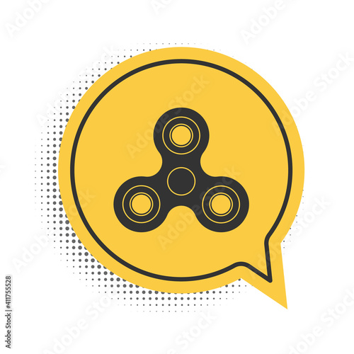 Black Fidget spinner icon isolated on white background. Stress relieving toy. Trendy hand spinner. Yellow speech bubble symbol. Vector.