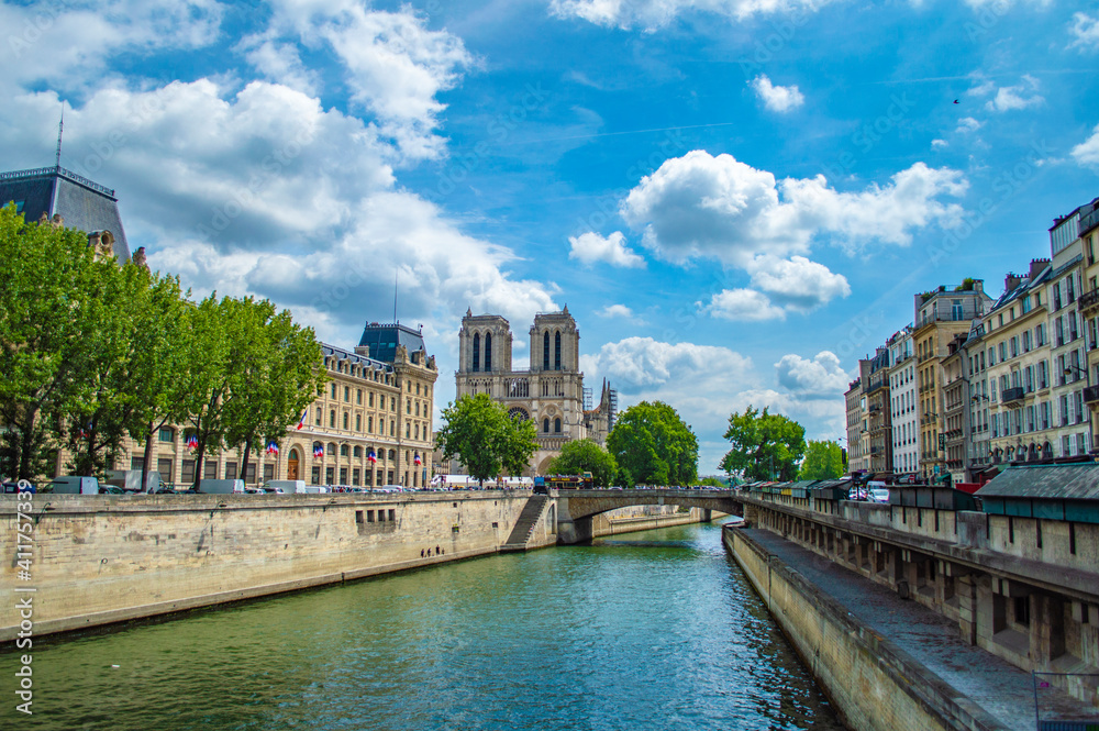 Paris, France - July 19, 2019: A scenic view of Paris with river Seine and Notre Dame cathedral