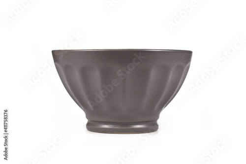 Dark gray ceramic bowl isolated on white background photo