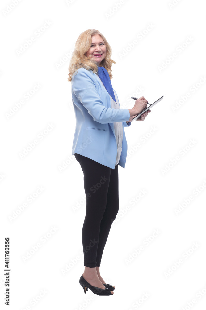 smiling woman pointing to a blank space in the clipboard . smiling woman pointing to a blank space in the clipboard .
