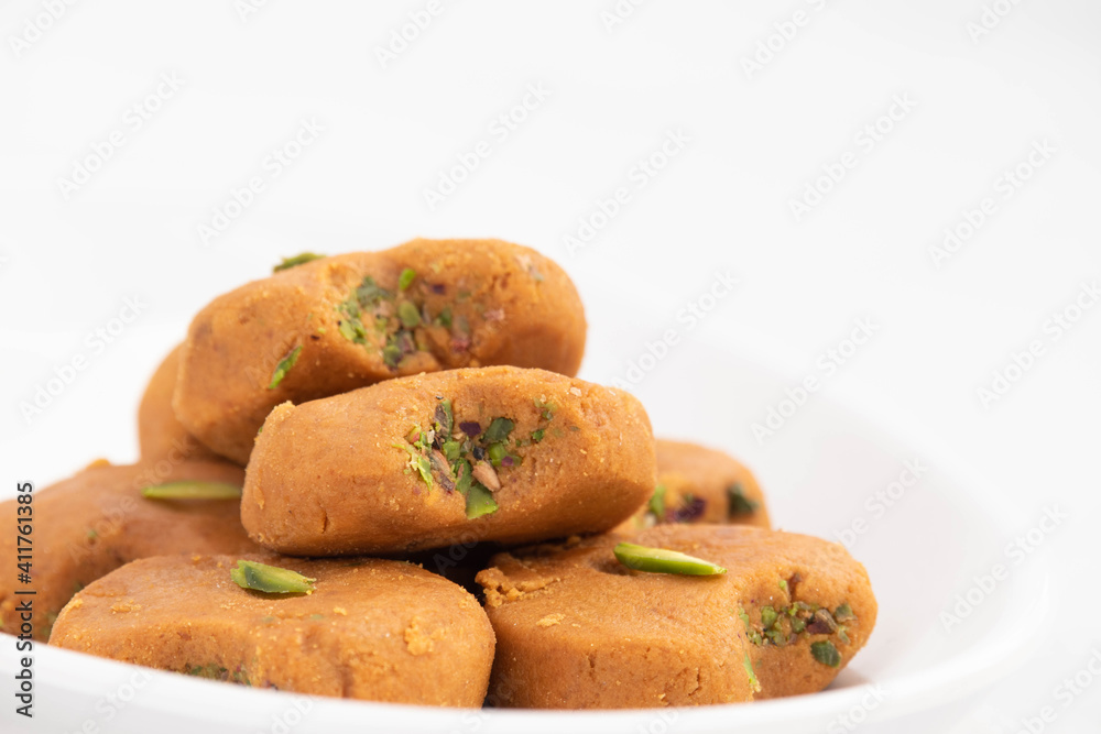 Mathura Peda Or Pera Made Of Milk Fudge Khoya Mawa Kesar Pista Mava Malai In Desi Ghee Is Enjoyed On Occasions Like Diwali Pooja Holi Rakshabandhan Eid Deepavali And Offered To Divine God During Puja Mathura Peda Or Pera Made Of Milk Fudge Khoya Mawa Kesar Pista Mava Malai In Desi Ghee Is Enjoyed On Occasions Like Diwali Pooja Holi Rakshabandhan Eid Deepavali And Offered To Divine God During Puja