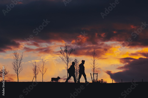 family trekking on the mountain with sunset, Bilbao, Spain