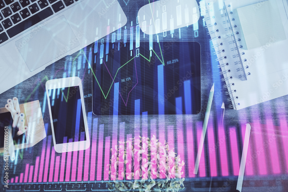 Double exposure of forex chart hologram over desktop with phone. Top view. Mobile trade platform concept. Double exposure of forex chart hologram over desktop with phone. Top view. Mobile trade platform concept.
