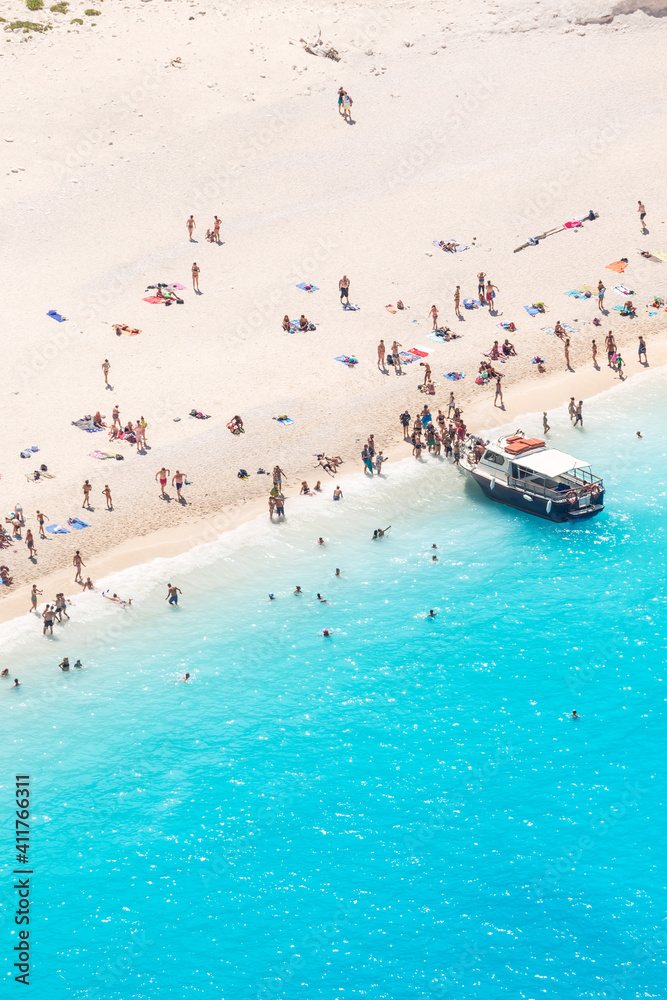 Aerial view of beach in summer with people. Zakynthos, Greek Islands, Greece Aerial view of beach in summer with people. Zakynthos, Greek Islands, Greece