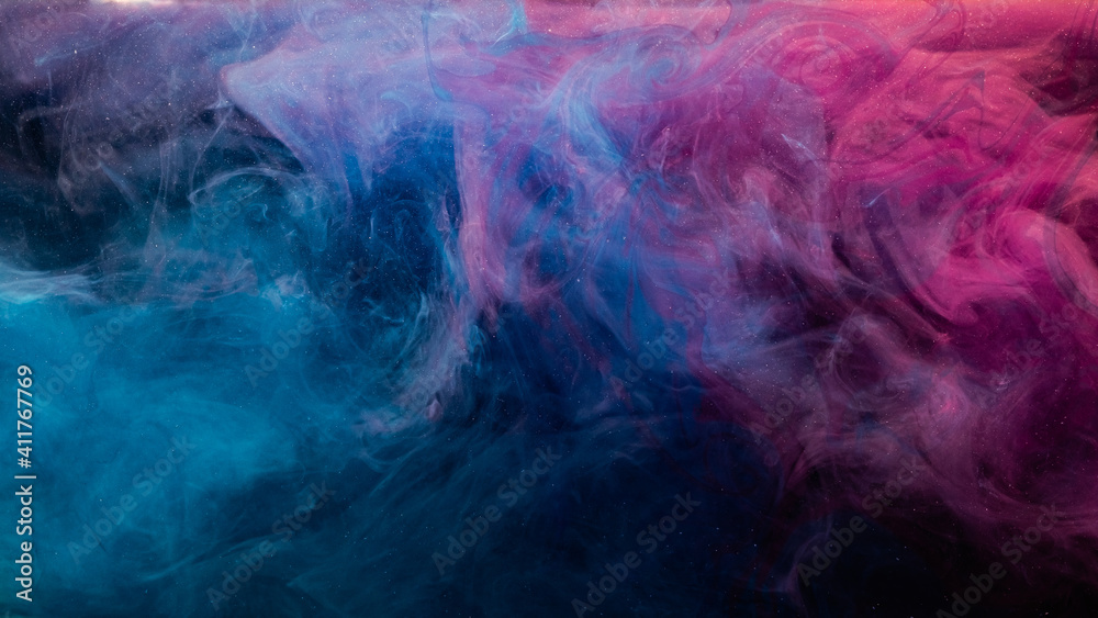 Ink in water. Colorful background. Contrast fume cloud. Soft steam texture. Glowing neon blue magenta pink glitter haze blend on dark. Ink in water. Colorful background. Contrast fume cloud. Soft steam texture. Glowing neon blue magenta pink glitter haze blend on dark.