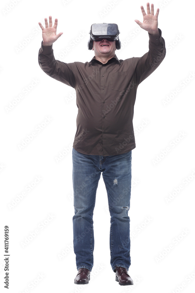 in full growth. casual man in virtual reality glasses. in full growth. casual man in virtual reality glasses.
