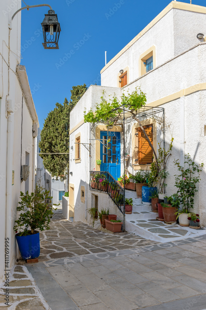 Traditional alley with whitewashed houses  during winter time  in lefkes Paros island