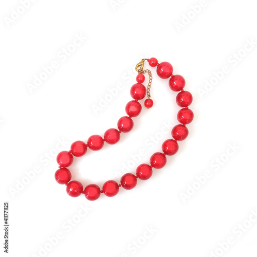 Red round beads isolated on white background