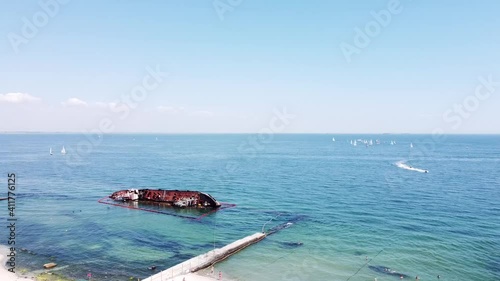 shooting from a quadcopter sea view and a sunken ship
