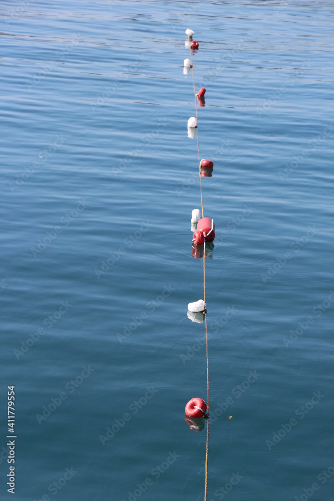 Plastic ball water trail closeup in the sunny day Plastic ball water trail closeup in the sunny day
