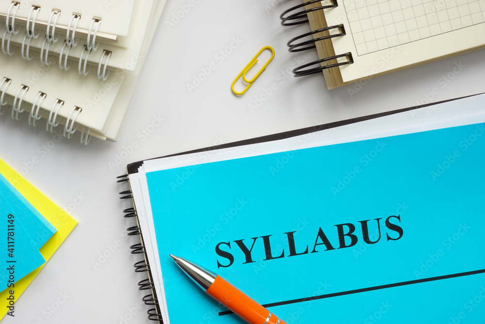 Φωτογραφία Syllabus educational plan and papers on the desk.