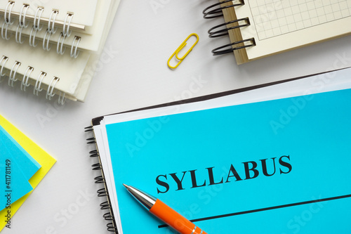 Syllabus educational plan and papers on the desk. photo
