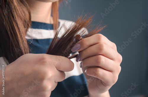 Woman hand hair