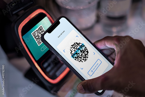 Contactless and cashless payment through qr code and mobile banking photo