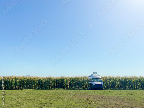 Camper van against blue sky