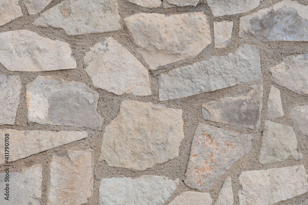 image of mortared stone wall in rural environment image of mortared stone wall in rural environment