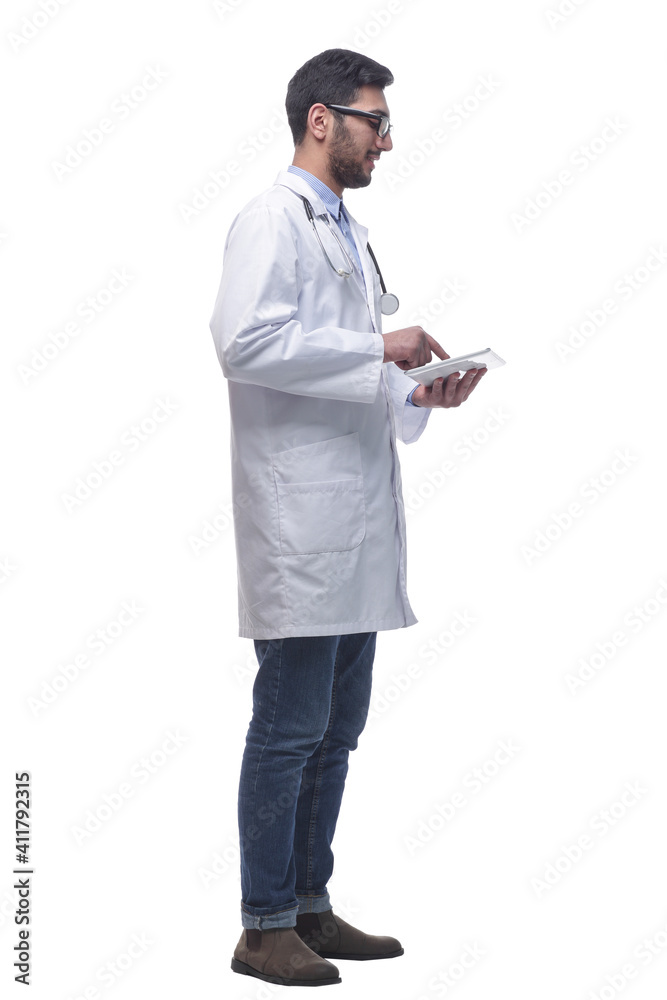 male doctor using a digital tablet. isolated on a white background. male doctor using a digital tablet. isolated on a white background.
