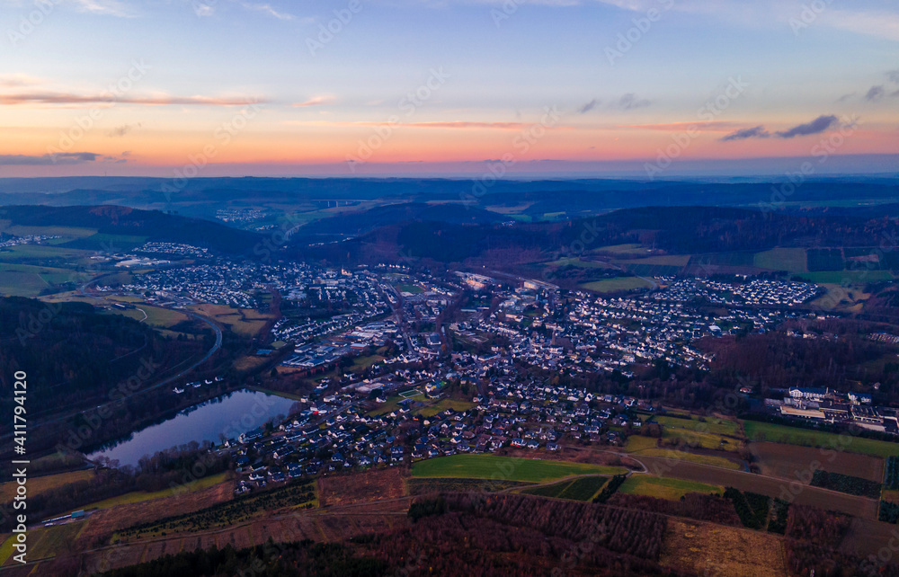 City of Olsberg in the Sauerland in Germany at sunset City of Olsberg in the Sauerland in Germany at sunset