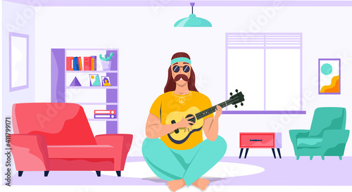 Male bard with ukulele in hands. Musician is playing strings on instrument. Person creates music. Guitarist composes songs and plays his own melody on guitar. Mustachioed man singing at home
