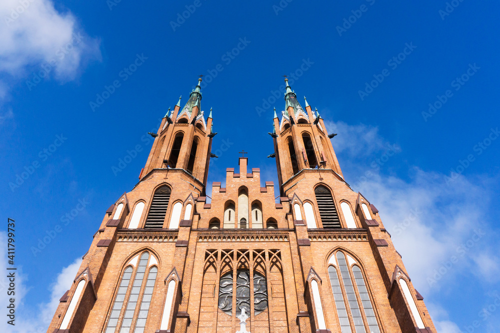 Cathedral Basilica of the Assumption of the Blessed Virgin Mary in Białystok city. Baroque style architecture. Heaven blue cloudy sky background. Church in Poland.