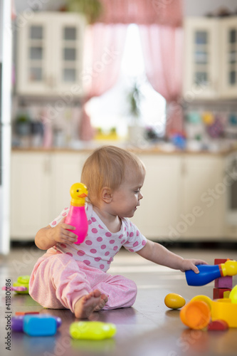 Baby one year old plays