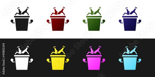 Set Beer bottles in ice bucket icon isolated on black and white background. Vector.