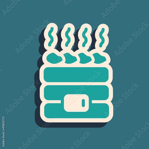 Green Hot sauna stones icon isolated on green background. Spa resort recreation, bathhouse relaxation. Hot stones on electric heater. Long shadow style. Vector.