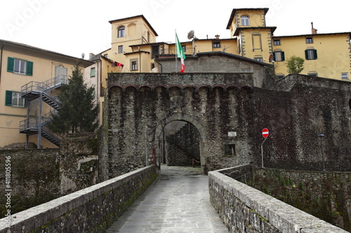 The Porta Miccia or Porta di Castruccio seen from the Ponte Santa Lucia by Castruccio Castracani in the old town of Castelnuovo di Garfagnana