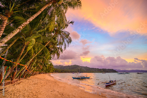 Port Barton Beach at sunset on paradise island, tropical travel destination - Port Barton, San Vicente, Palawan, Philippines.