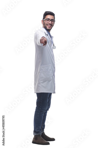 confident doctor with a stethoscope looking at you . isolated on a white background.